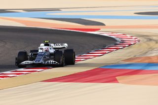 BAHRAIN, BAHRAIN - MARCH 12: Yuki Tsunoda of Japan driving the (22) Scuderia AlphaTauri AT03 on track during Day Three of F1 Testing at Bahrain International Circuit on March 12, 2022 in Bahrain, Bahrain.